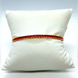 Kate Spade gold tone bangle bracelet